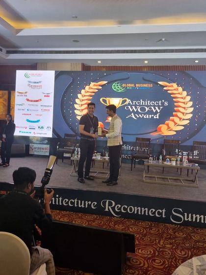 On stage at the Architecture Reconnect Summit, receiving another prestigious award. These moments celebrate the successful collaboration between our team and our clients.