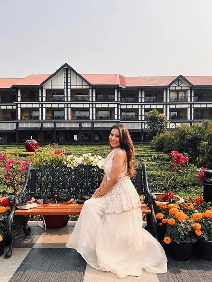 Posing in this beautiful garden, my ivory outfit felt right at home. It’s a versatile look that works for many occasions.