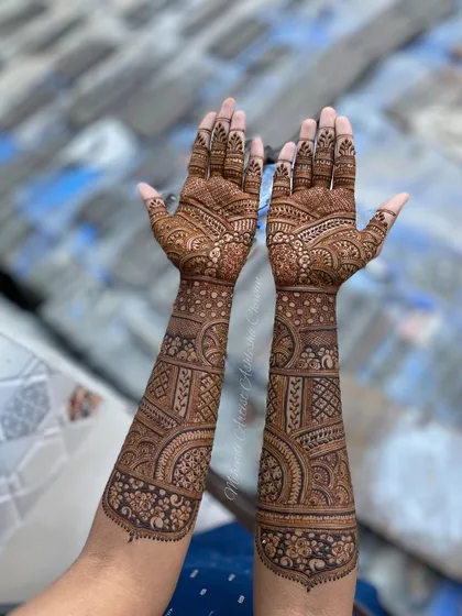An engagement mehendi for a bride-to-be. The design is full and intricate, creating a stunning look for her special celebration.