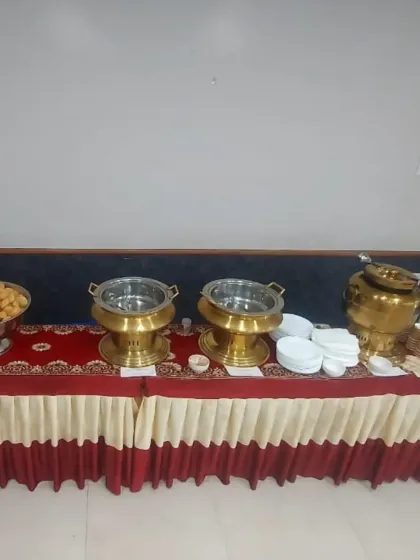 A simple and clean setup for a smaller gathering, featuring a pani puri station and other snacks. We cater to events of all sizes.