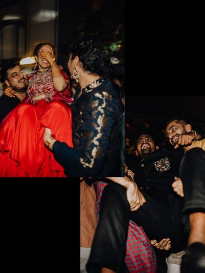 The friends and family lifting the bride and groom during the Sangeet. A moment of chaotic, joyful celebration.