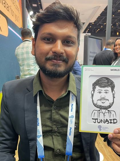 A framed caricature for a guest at the Worldline exhibition. The frame adds a professional touch, making it a ready-to-display souvenir.