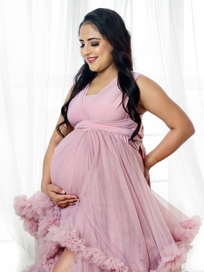 A variety of poses in a beautiful ruffled pink gown, showing its versatility for creating soft, romantic, and glamorous solo maternity portraits.