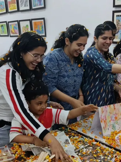 The joy of celebrating together! Our students and instructors having a blast with flower petals during our eco-friendly Holi celebration.
