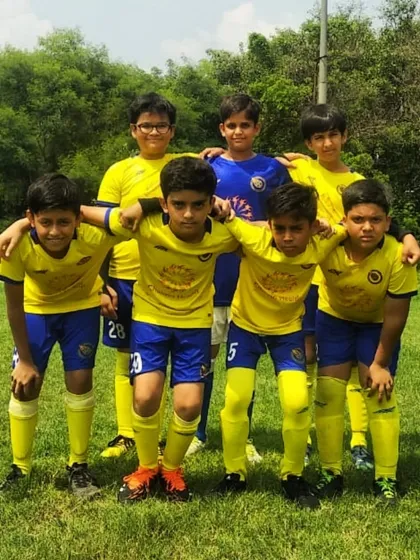 The U13 team, united and focused before their league match against Capital FA.
