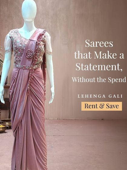 This dusty pink drape saree makes a statement without the spend. It combines the elegance of a saree with the modern ease of a pre-draped outfit, perfect for a cocktail or reception.