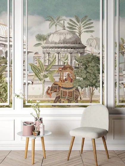 This elegant wallpaper, framed by classic white molding, depicts a traditional Indian procession with a decorated elephant, creating a window into a bygone royal era.