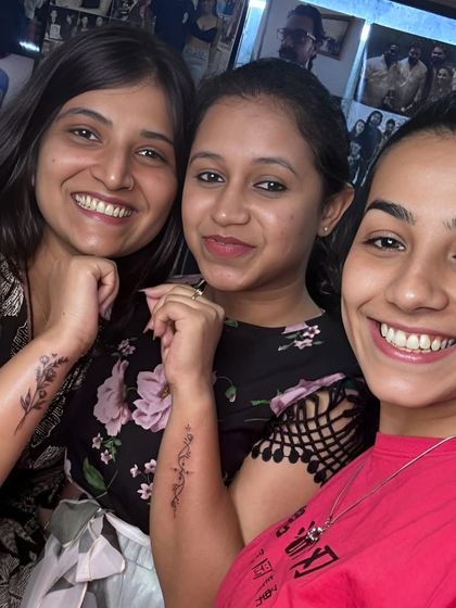 More happy clients showing off their new floral and script tattoos. I love it when friends come in together to share the experience.