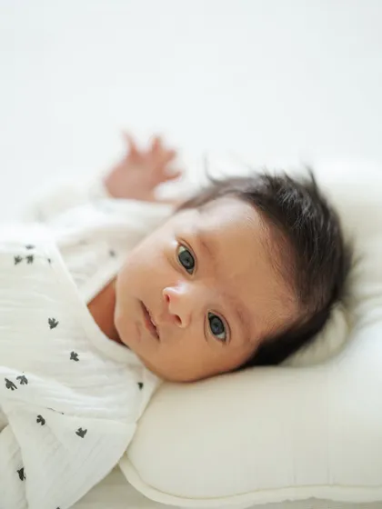 Those beautiful, curious eyes. This is one of my favorite photos of Caden from our at-home session, a simple and natural portrait of him just being himself.
