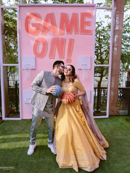 A playful "Game On!" setup at the Siliguri wedding, where the couple's fun-loving personalities shine through. It’s these personal touches that make a wedding story unique.