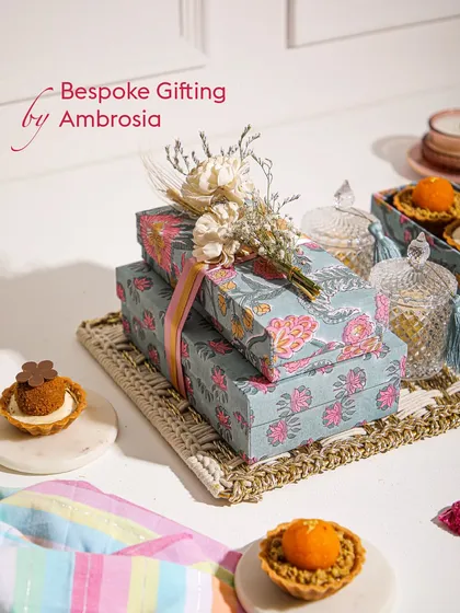 A close-up of our bespoke Rakhi gift boxes, adorned with dried flowers. We create packaging as special as what’s inside.