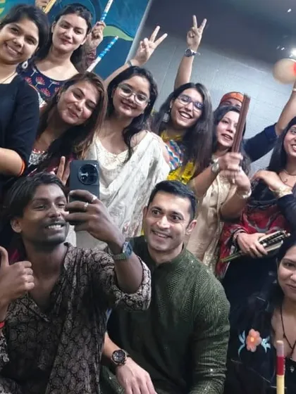 All smiles after a fun-filled Dandiya dance session. This is what our community is all about.