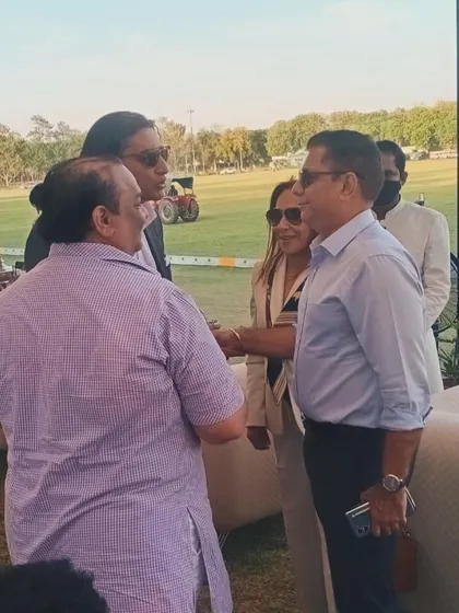 Greeting Mr. Sanjay Bhatia, Assistant Commissioner of Police for Delhi, at a polo match. We are honored to serve respected members of our community.