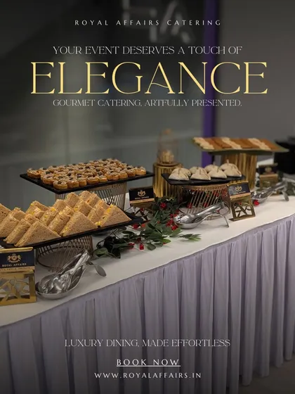 Your event deserves a touch of elegance, which I deliver through artfully presented gourmet catering. This clean and sophisticated buffet setup features sandwiches and other appetizers on a beautifully draped table.