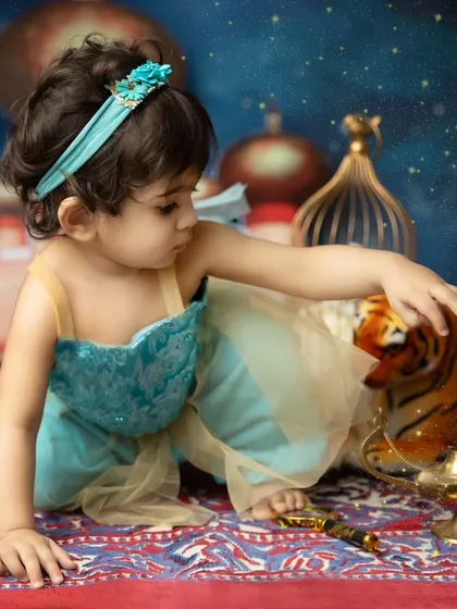 Princess Jasmine and her trusty tiger, Rajah. This shot captures the story and magic of the theme, creating a portrait that is more than just a photo.