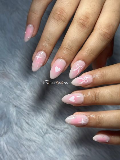 A dreamy, Pinterest-inspired set with a soft pink aura base and delicate white hearts, bows, and sparkles.