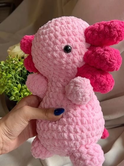 Another angle of our pink axolotl plushie. All our toys are made with eco-friendly materials and are safe for children.
