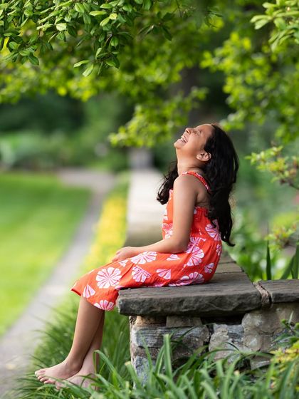 A moment of pure, uninhibited laughter. This is why I love candid photography; it captures the true spirit of childhood.