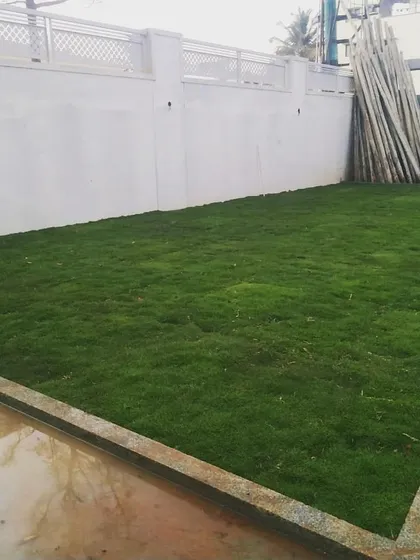 A simple, perfectly installed lawn can completely change the look of a home. We prepared the ground and laid this lush green lawn for a villa in Yelahanka, creating a clean and classy outdoor space.