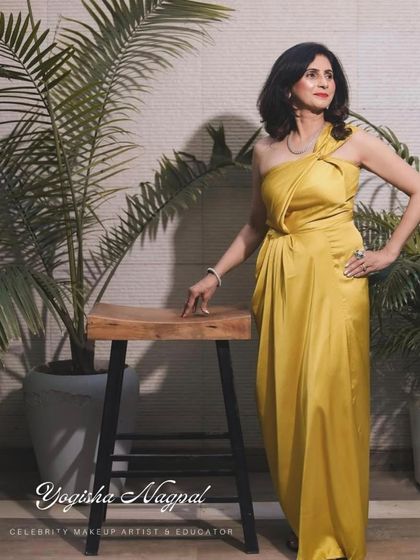 Another portrait of this accomplished client. The makeup is designed to look flawless from every angle, perfect for a public figure.