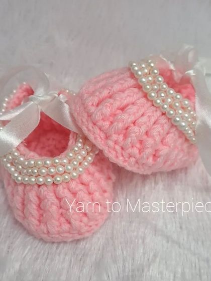 A version of my ballerina-style booties in pink with a clean white ribbon, showing how a simple change can create a new look.