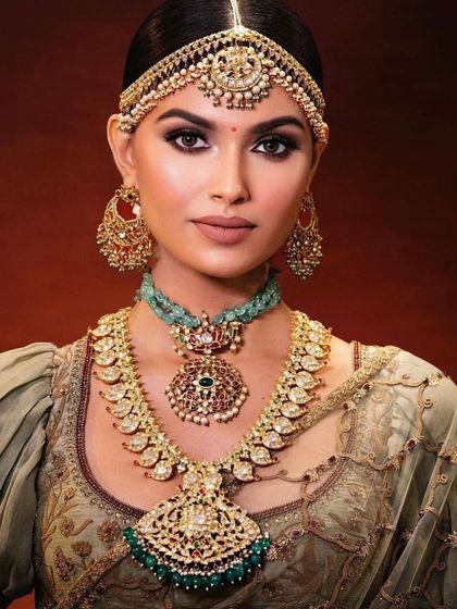 A full-face portrait of the South Indian look, showing the balanced and harmonious makeup.