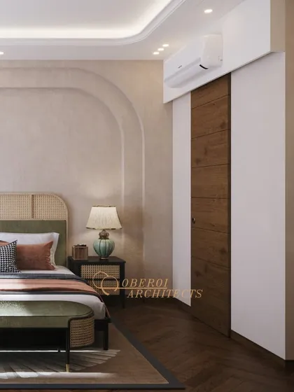 The design incorporates a sliding wooden door, which conceals storage and maintains the room's clean and uncluttered aesthetic.