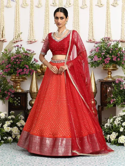 The full ensemble, with the dupatta elegantly draped, creates a look of regal splendor.