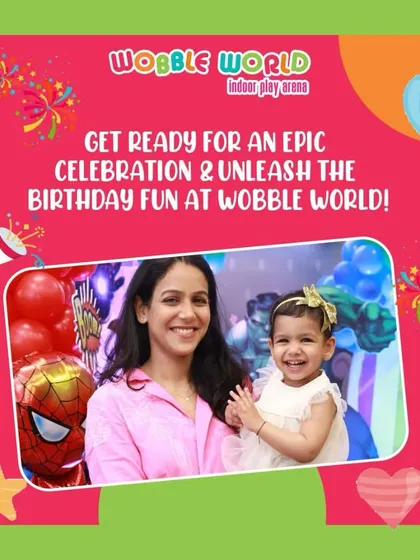 A mother and her smiling toddler enjoying an epic birthday celebration. Our themed backdrops make for perfect photo opportunities.