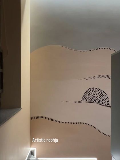 Another angle of the abstract staircase mural, showing how the design wraps around the wall and creates a continuous flow.