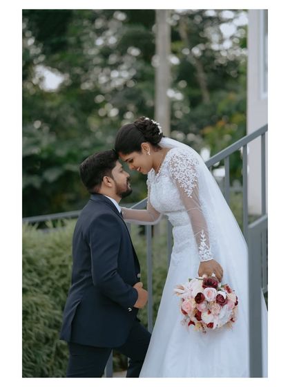An intimate portrait of the couple sharing a moment of affection. Posed yet natural, this style of couple photography is a key part of my wedding packages.