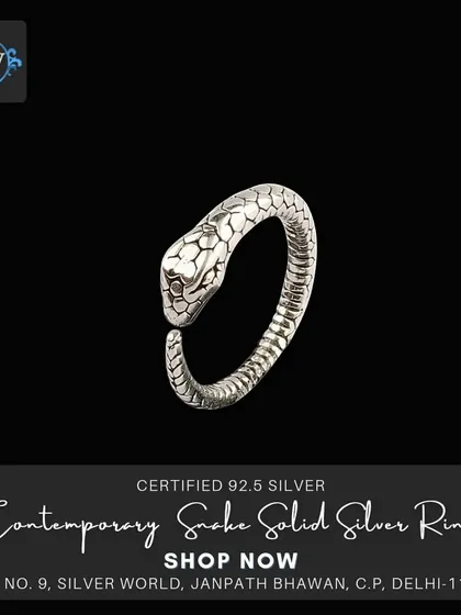 A contemporary take on the snake ring, this solid silver piece has a textured, scale-like pattern and wraps sleekly around the finger. It is adjustable for a perfect fit.