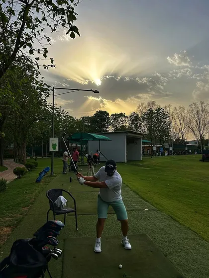 A spectacular sunset with sun rays breaking through the clouds, creating a stunning backdrop for an evening session.