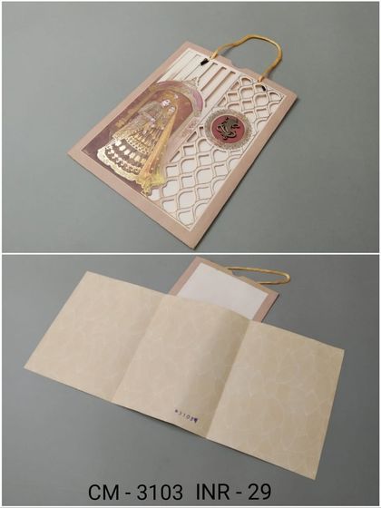 A unique shaadicard with a laser-cut window showing a bride's kalire. The card has a handle for easy carrying and includes a multi-fold insert.