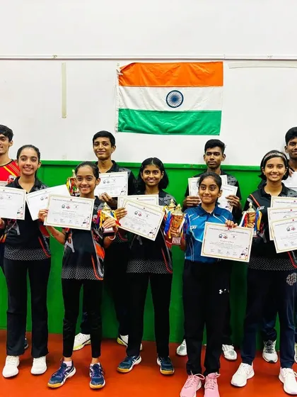 A group of our talented players proudly displaying their certificates and trophies after a successful campaign at the 1st Thane District Tournament. We believe in celebrating every achievement, fostering a community of champions.