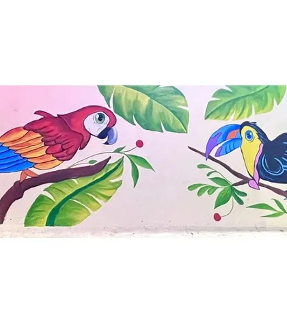 I also paint large-scale wall murals to bring a room to life. This colorful piece features a macaw and a toucan, painted with durable acrylics to create a lasting and joyful atmosphere.
