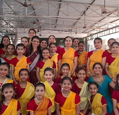 A proud group photo with all the students who appeared for their university certification exams. Their hard work has paid off.