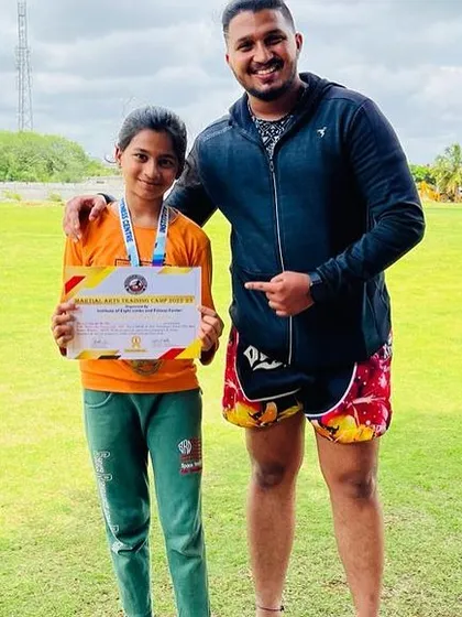 The reward for hard work. I am proud of this young champion for her performance and dedication at our Muay Thai training camp. Every certificate is earned through sweat and effort.