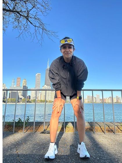 Taking a moment during a shakeout run in Chicago, with the stunning skyline behind me. The views along the way are part of what makes destination marathons so special.