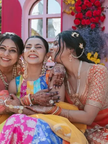 A heartwarming moment between the bride and her family during the Haldi. These celebrations are about connection, and I design the space to foster these beautiful interactions.
