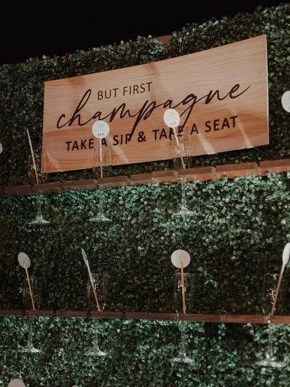 A creative and interactive champagne wall for a cocktail event. It's a fun way to welcome guests and get the party started.