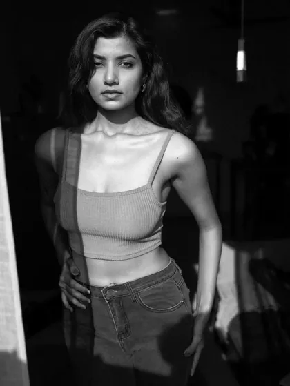 Using the harsh morning sun coming through a window to create strong shadows and highlights. This black and white shot is a great example of playing with natural light for a dramatic effect.