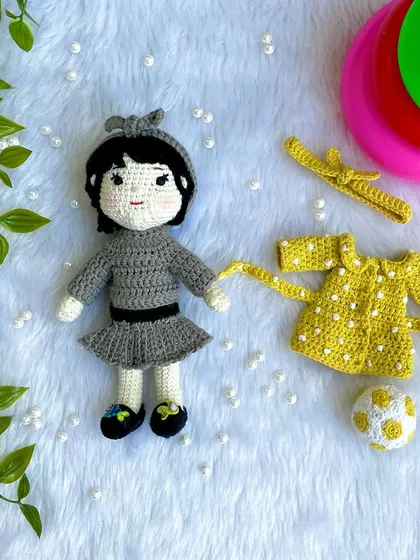 This special project was to recreate a little girl's first birthday outfits on her own mini replica doll. The doll comes with two removable dresses and accessories, making it a beautiful toy and a cherished memory keeper.