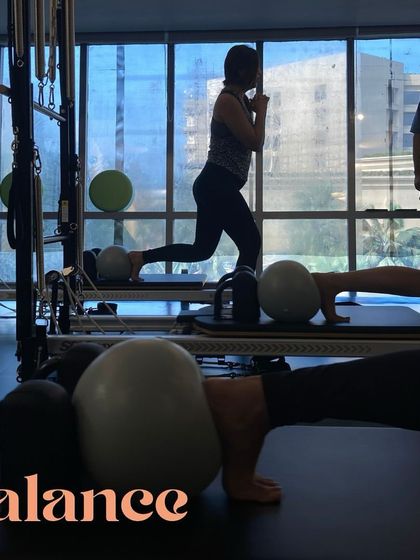 It's all about balance. A beautiful silhouette shot of our members finding their stability and focus during a challenging lunge series.