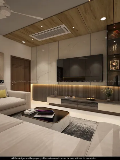 The TV wall in this living room is a focal point, with its combination of marble, fluted panels, and integrated display niches. The under-lit console adds to the modern aesthetic.