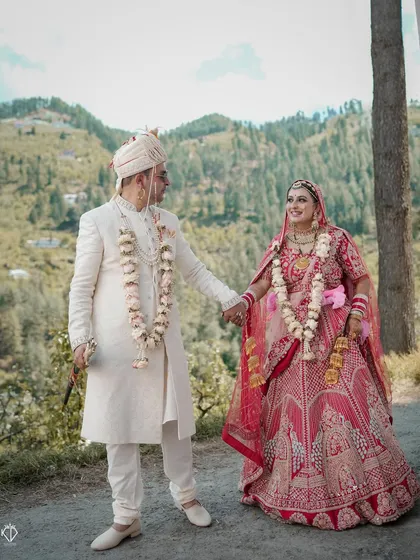 A duplicate of 140, this classic wedding portrait shows the couple holding hands on a mountain path in Jubbal.