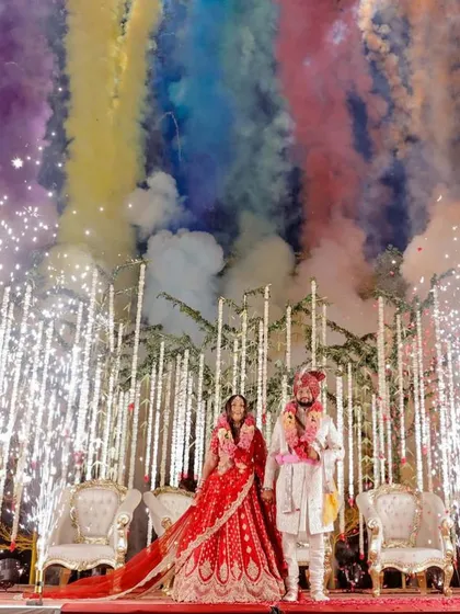 A spectacular shot of the bride and groom with fireworks. My HD makeup techniques ensure you look flawless even in dramatic, high-flash photography.