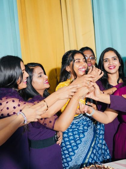 A fun, candid moment with my students during their graduation celebration.