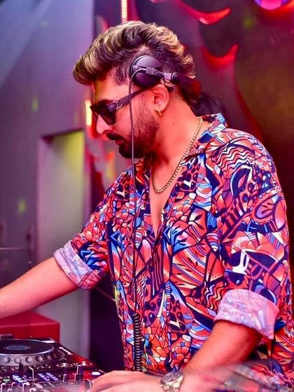 In the zone, mixing tracks and creating a vibe.