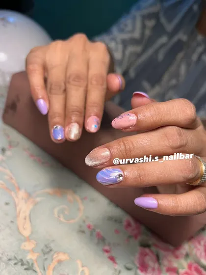 A soft and charming design featuring a pink and lavender color palette. I added a sculpted shell texture and a single diamond accent for a touch of oceanic elegance.